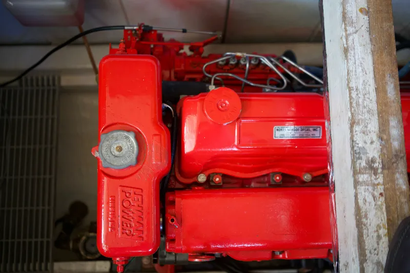 Slide: The Image of Red Lehman Power engine in a 1978 DeFever 39 boat. - 15