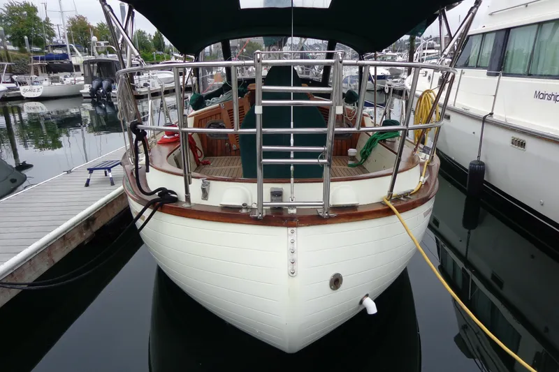 Slide: The Image of 1988 Ta Shing Tashiba Cutter sailboat docked at marina, rear view. - 50