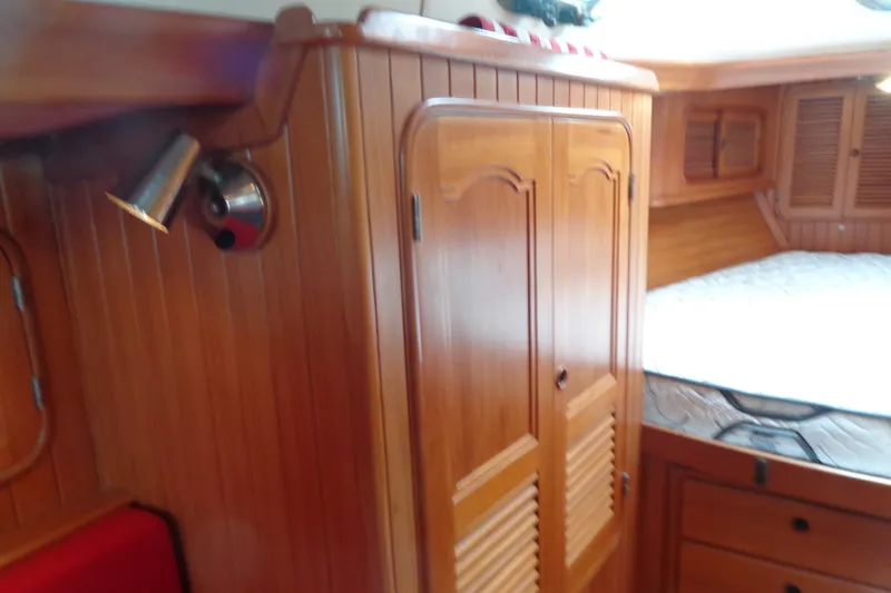 Slide: The Image of Interior of 1988 Ta Shing Tashiba Cutter with wooden cabinetry and cozy sleeping area. - 35