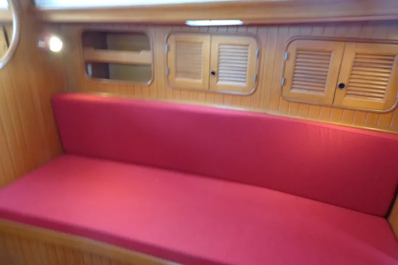 Slide: The Image of Red cushioned seating in 1988 Ta Shing Tashiba Cutter's wooden interior cabin. - 25