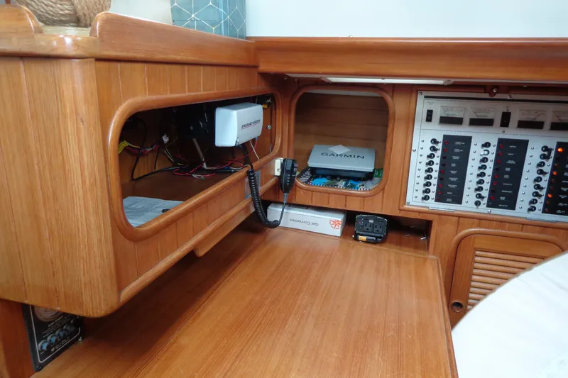 Slide: The Image of 1988 Ta Shing Tashiba Cutter navigation station with control panels and electronic equipment. - 24