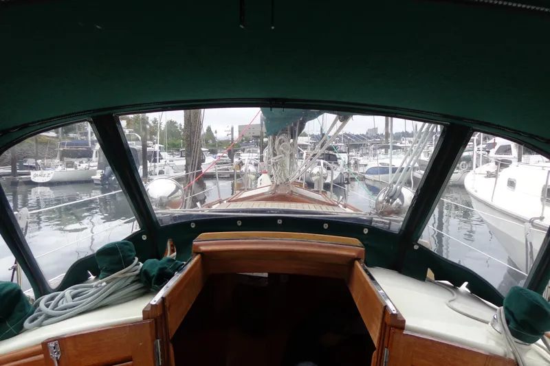 Slide: The Image of 1988 Ta Shing Tashiba Cutter sailboat cockpit view in marina setting. - 18