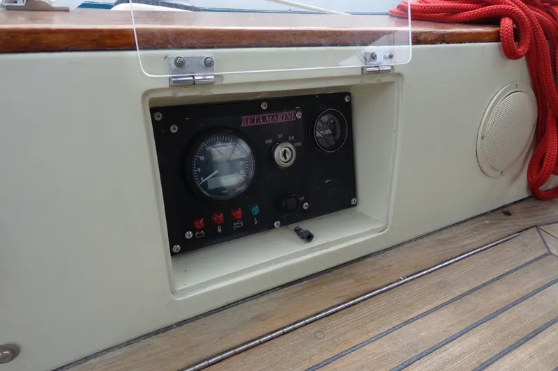 Slide: The Image of Control panel of a 1988 Ta Shing Tashiba Cutter sailboat with red rope. - 17
