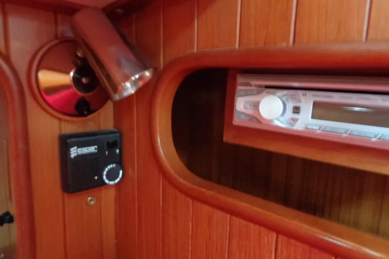 Slide: The Image of Interior of 1988 Ta Shing Tashiba Cutter with wooden paneling and audio system. - 45