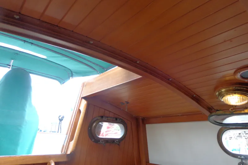 Slide: The Image of Interior view of 1988 Ta Shing Tashiba Cutter with wooden ceiling and porthole. - 27