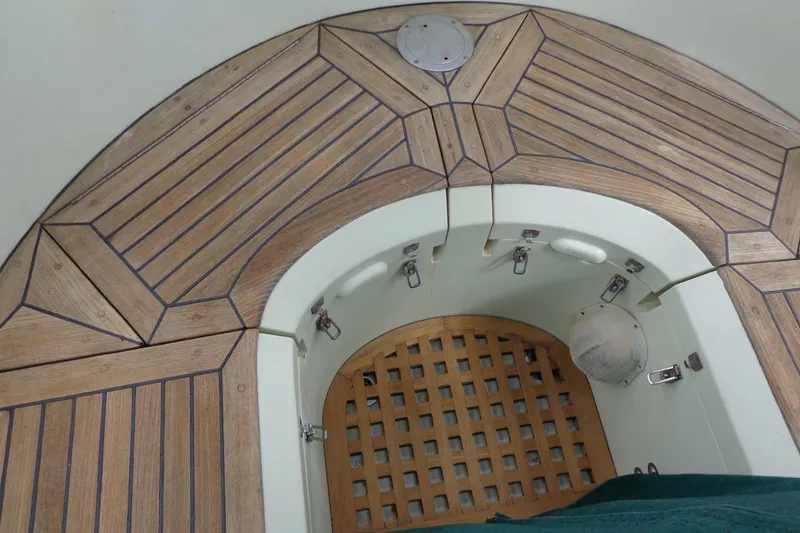 Slide: The Image of 1988 Ta Shing Tashiba Cutter with intricate wooden deck design and hatch details. - 16