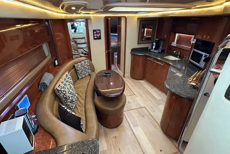 Slide: The Image of Luxurious interior of a 2006 Sea Ray 44 Sundancer yacht with modern amenities. - 19