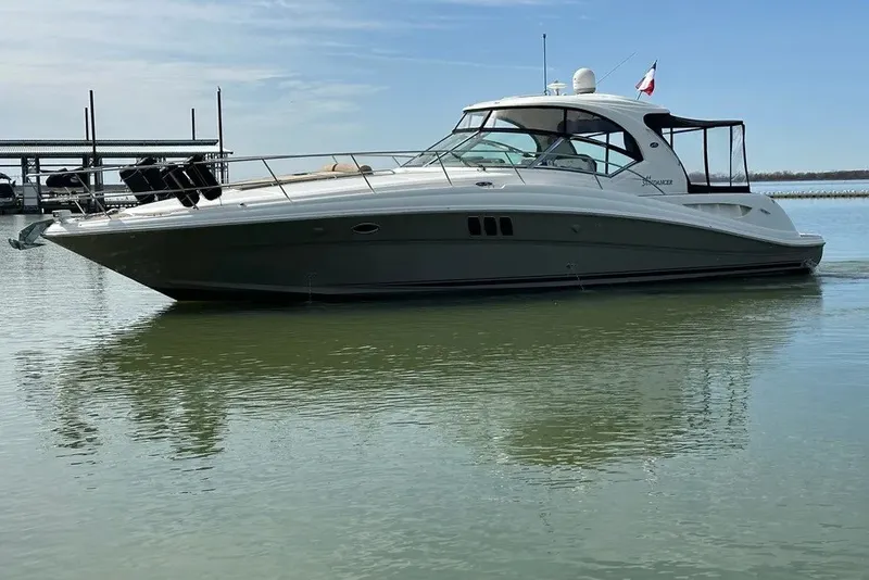 The Image of 2006 Sea Ray 44 Sundancer yacht on calm water, side view. - 0