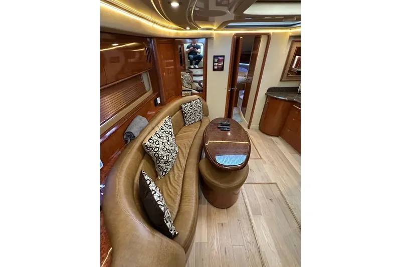 Slide: The Image of Luxurious interior of 2006 Sea Ray 44 Sundancer yacht with plush seating and elegant decor. - 21