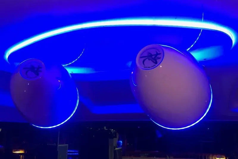 Slide: The Image of Blue-lit interior of a 2006 Sea Ray 44 Sundancer yacht. - 50