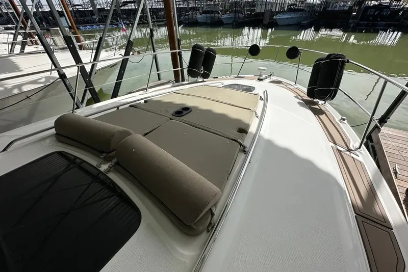 Slide: The Image of 2006 Sea Ray 44 Sundancer yacht with sunpad, docked in marina. - 35