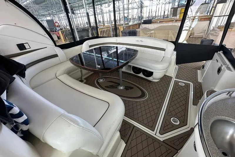 Slide: The Image of Luxurious interior of a 2006 Sea Ray 44 Sundancer yacht with elegant seating and table. - 28