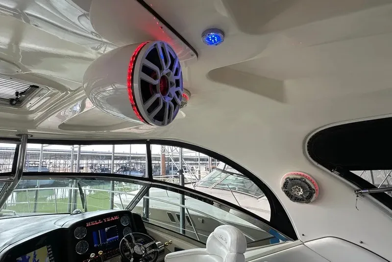 Slide: The Image of Interior of 2006 Sea Ray 44 Sundancer yacht with modern speakers and navigation controls. - 45