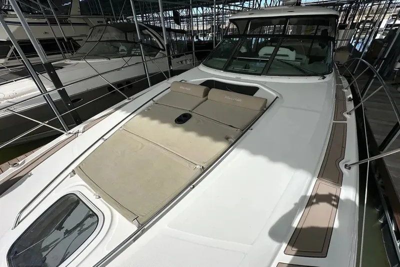 Slide: The Image of 2006 Sea Ray 44 Sundancer yacht with sunpad, docked in marina. - 36