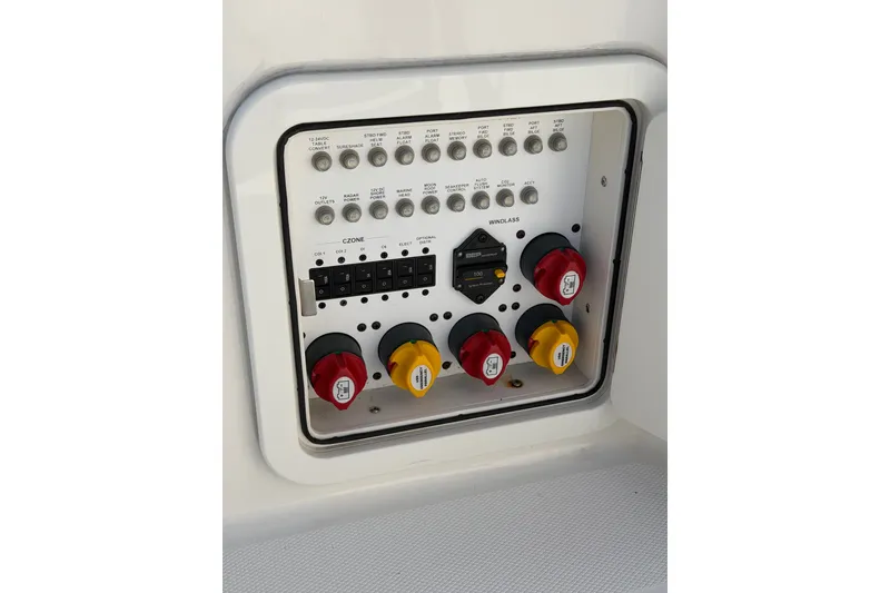 Slide: The Image of Electrical control panel on 2024 World Cat 400 DC-X boat. - 34