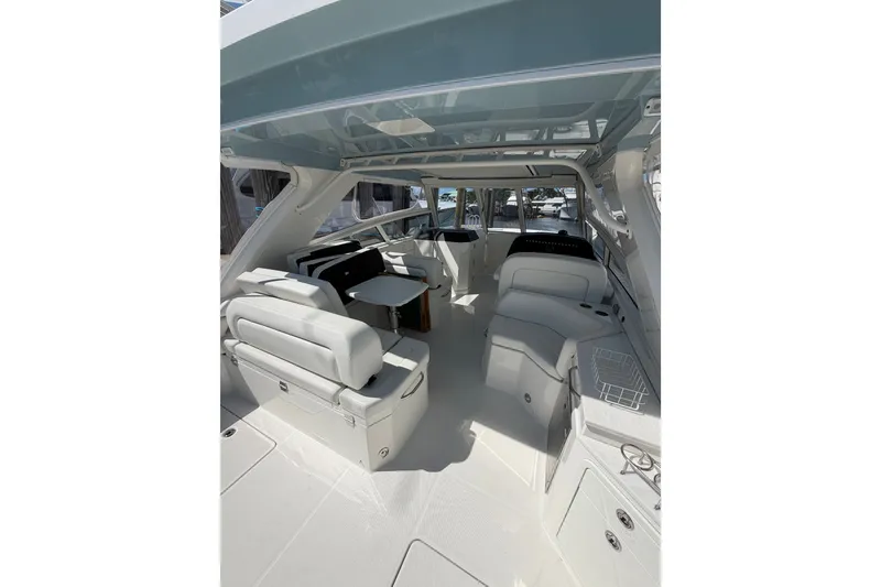 Slide: The Image of Interior of 2024 World Cat 400 DC-X boat, featuring spacious seating and modern design. - 44