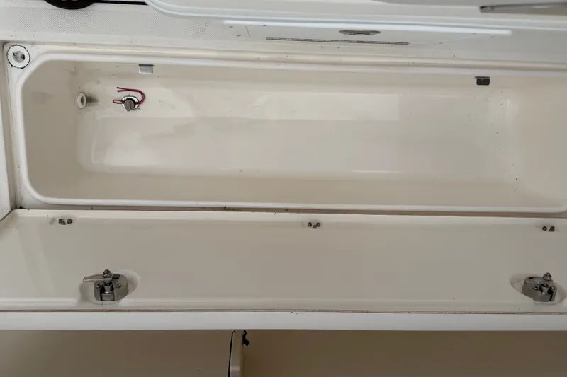 Slide: The Image of Open storage compartment on Seaborn SX 239 boat, 2021 model. - 13
