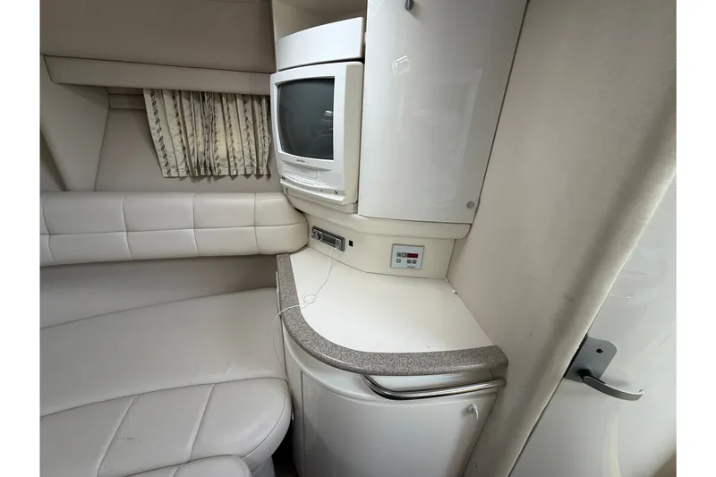 Slide: The Image of Interior of 2002 Formula 27 Performance Cruiser with TV and seating area. - 17