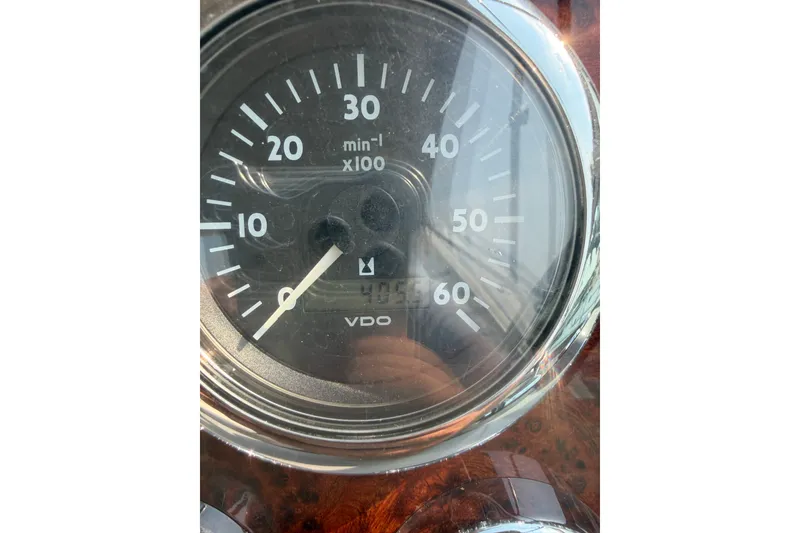 Slide: The Image of Close-up of a VDO tachometer in a 2002 Formula 27 Performance Cruiser. - 7