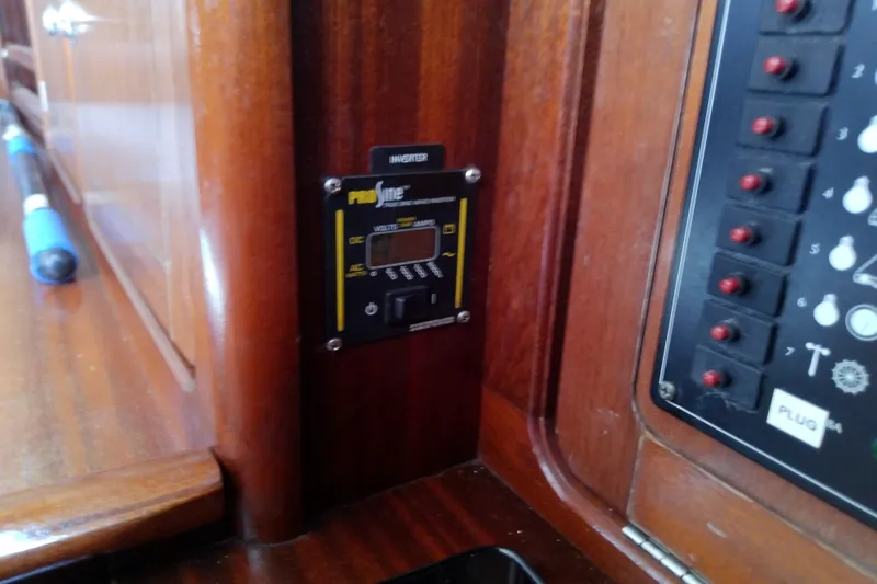 Slide: The Image of Control panel inside a 2001 Bavaria Cruiser 37 yacht, featuring a ProSine inverter. - 31