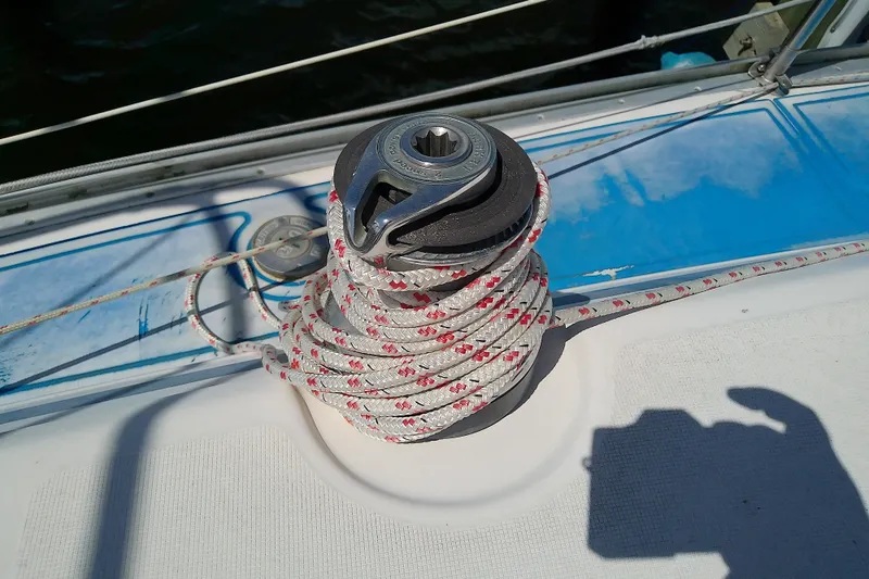 Slide: The Image of Winch with coiled rope on 2001 Bavaria Cruiser 37 sailboat deck. - 20