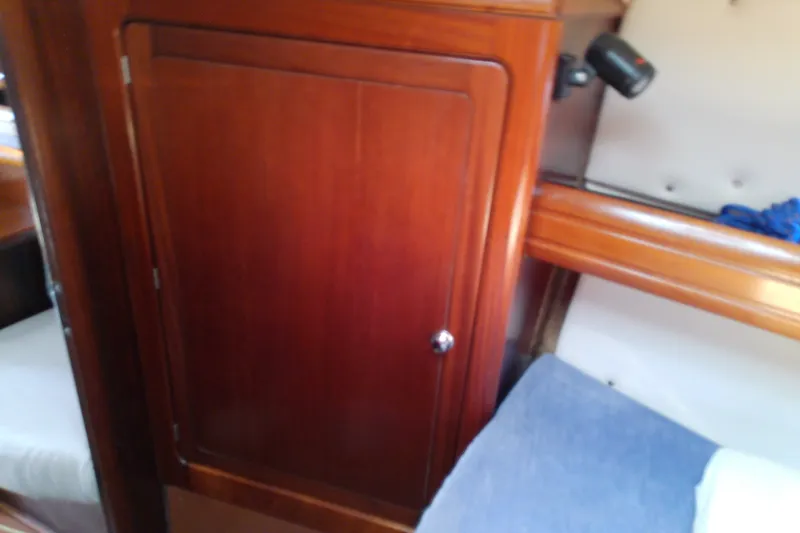 Slide: The Image of Wooden interior cabin of a 2001 Bavaria Cruiser 37 yacht. - 42