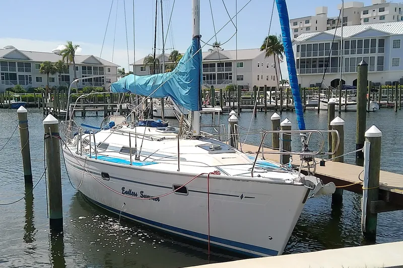 The Image of Bavaria Cruiser 37 sailboat docked at marina, 2001 model, sunny day. - 1