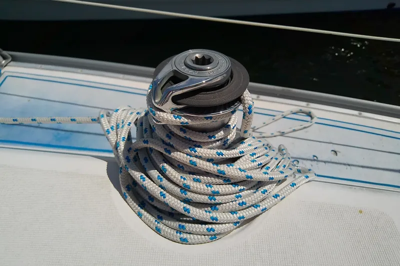 Slide: The Image of Winch with coiled rope on Bavaria Cruiser 37 sailboat, 2001 model. - 19