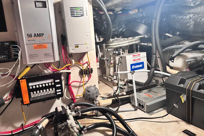 Slide: The Image of Engine room of 2004 Cruisers Yachts 455 Express Motoryacht with electrical systems and wiring. - 16
