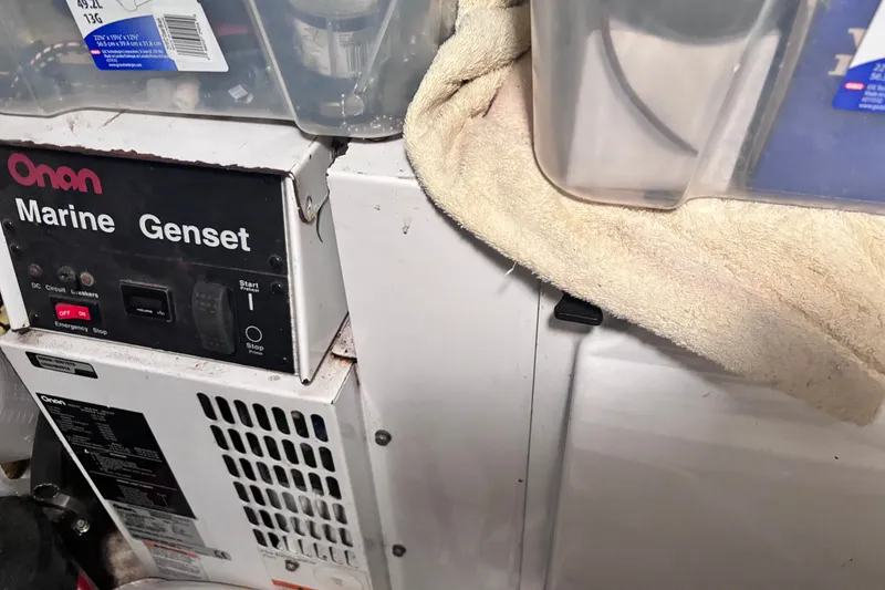 Slide: The Image of Onan Marine Genset in 2004 Cruisers Yachts 455 Express Motoryacht engine room. - 17