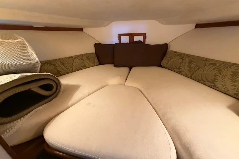 Slide: The Image of Interior cabin of 1987 Carver 32 Aft Cabin Motor Yacht with cozy bedding. - 29