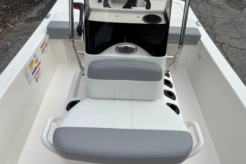 Slide: The Image of 2026 Mako Pro Skiff 13 CC boat interior with seating and console details. - 12