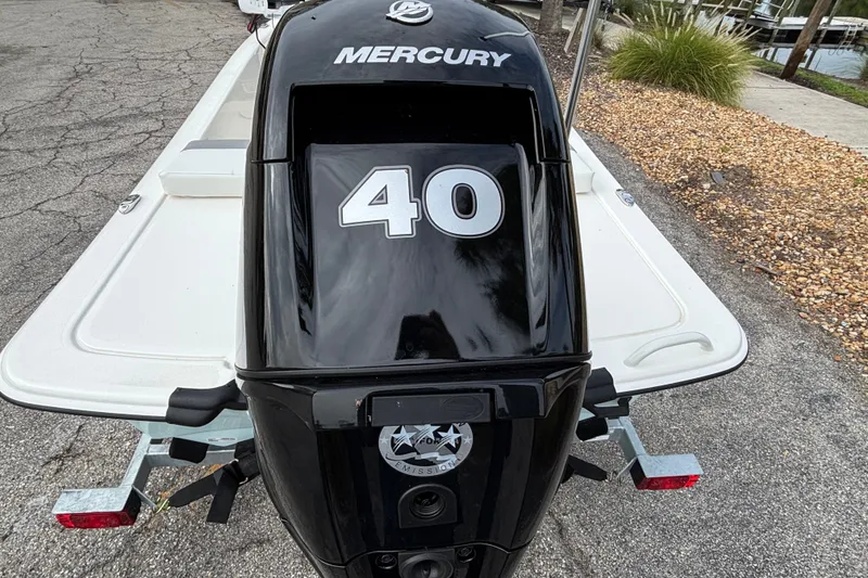 Slide: The Image of Outboard motor on 2026 Mako Pro Skiff 13 CC boat, featuring Mercury 40 horsepower engine. - 4