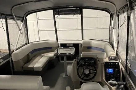 Slide: The Image of 2024 Princecraft Vectra 21 RL pontoon boat interior with seating and steering console. - 5