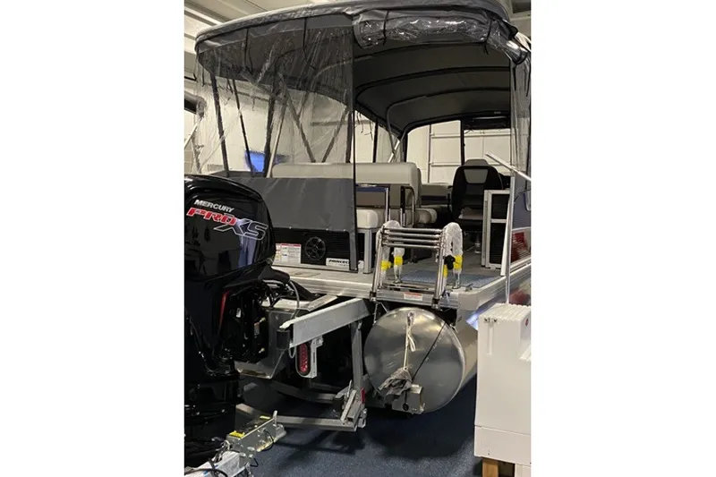 Slide: The Image of 2024 Princecraft Vectra 21 RL pontoon boat with Mercury Pro XS engine in showroom. - 4