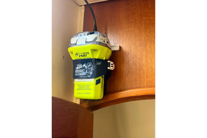 Slide: The Image of Emergency beacon mounted on 2007 Hunter 41 Deck Salon yacht interior. - 44