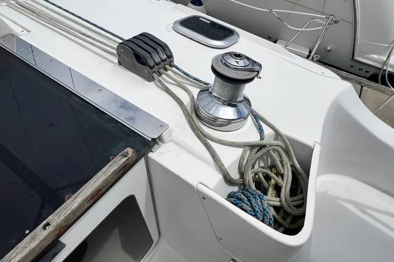Slide: The Image of Deck of 2007 Hunter 41 Deck Salon sailboat with winch and ropes. - 21