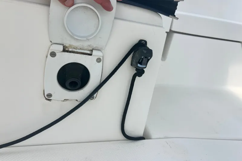 Slide: The Image of Fuel cap and rope cleat on 2007 Hunter 41 Deck Salon yacht. - 17