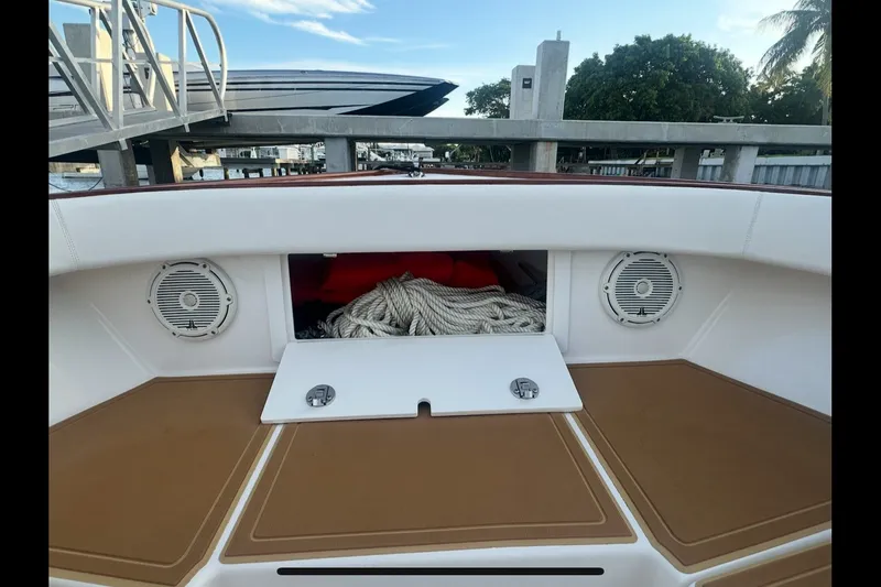Slide: The Image of 2019 Albury Brothers 23 Forward Seating boat with storage compartment and speakers. - 18