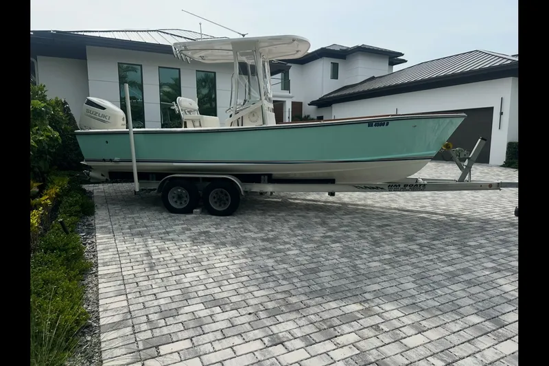Slide: The Image of 2019 Albury Brothers 23 Forward Seating boat on trailer in driveway. - 31