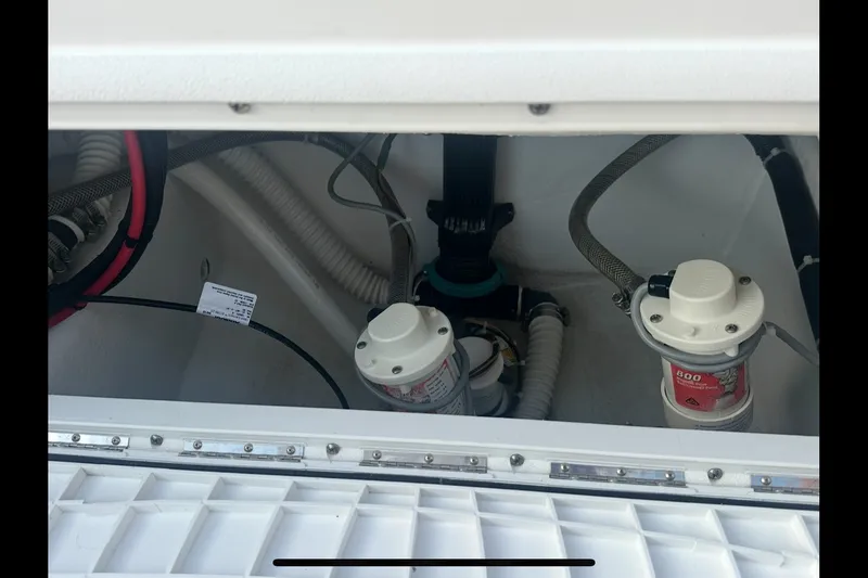 Slide: The Image of 2019 Albury Brothers 23 Forward Seating boat interior wiring and pump system. - 23