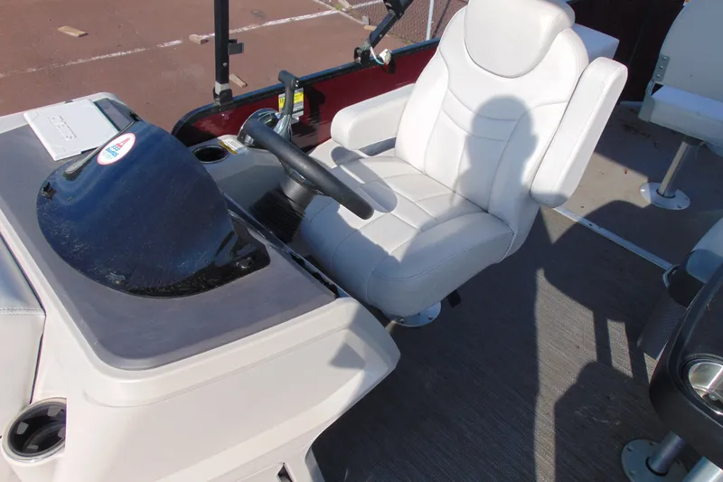 Slide: The Image of Captain's chair and helm of 2022 Godfrey Sweetwater 2186 FS pontoon boat. - 11
