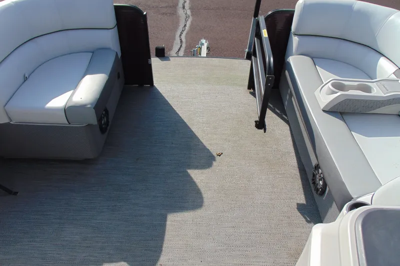 Slide: The Image of Interior of 2022 Godfrey Sweetwater 2186 FS pontoon boat with spacious seating and cup holders. - 9