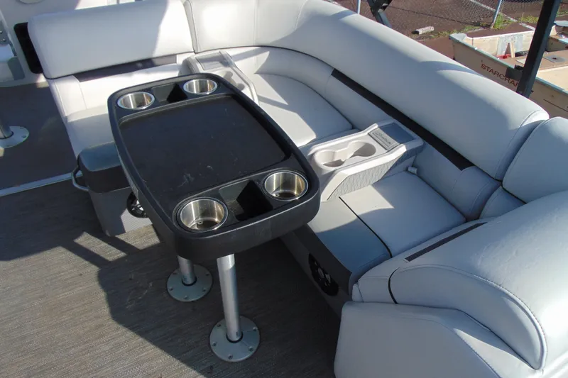 Slide: The Image of Luxurious seating area on 2022 Godfrey Sweetwater 2186 FS pontoon boat with cup holders. - 10