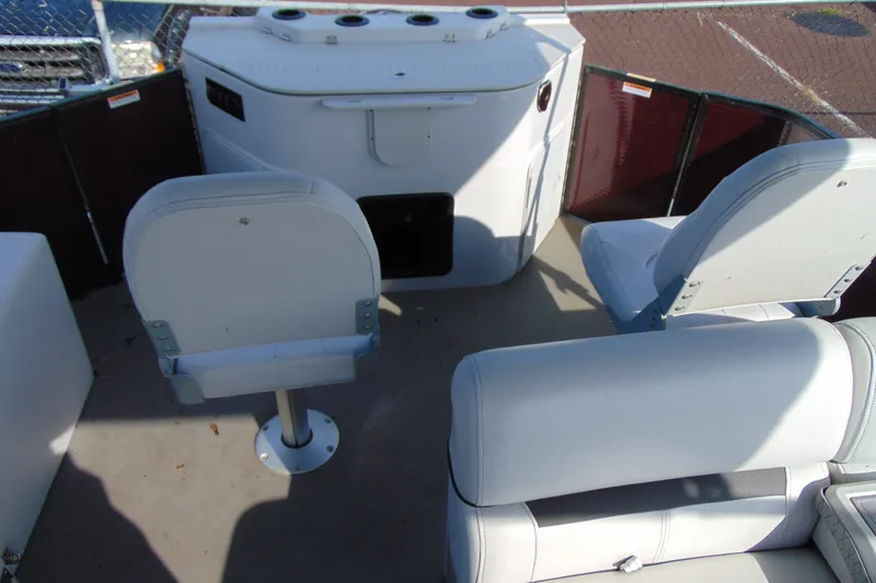 Slide: The Image of Interior of 2022 Godfrey Sweetwater 2186 FS pontoon boat with white seating and console. - 14