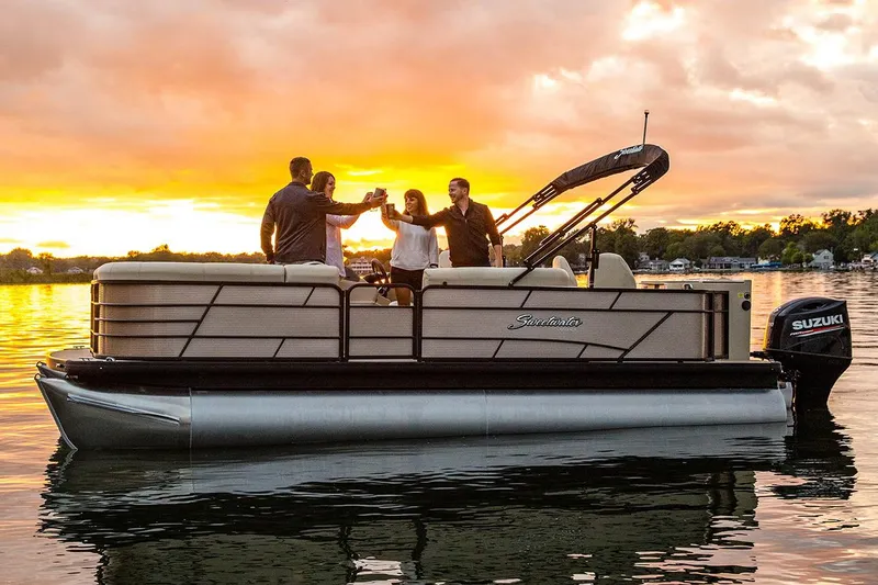 The Image of Manufacturer Provided Image: 2022 Godfrey Sweetwater 2186 FS pontoon boat at sunset with people celebrating. - 0