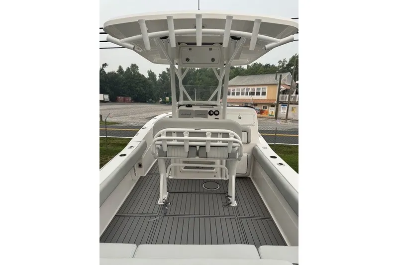 Slide: The Image of 2022 Sea Fox 249 Avenger boat interior with helm and seating area. - 27
