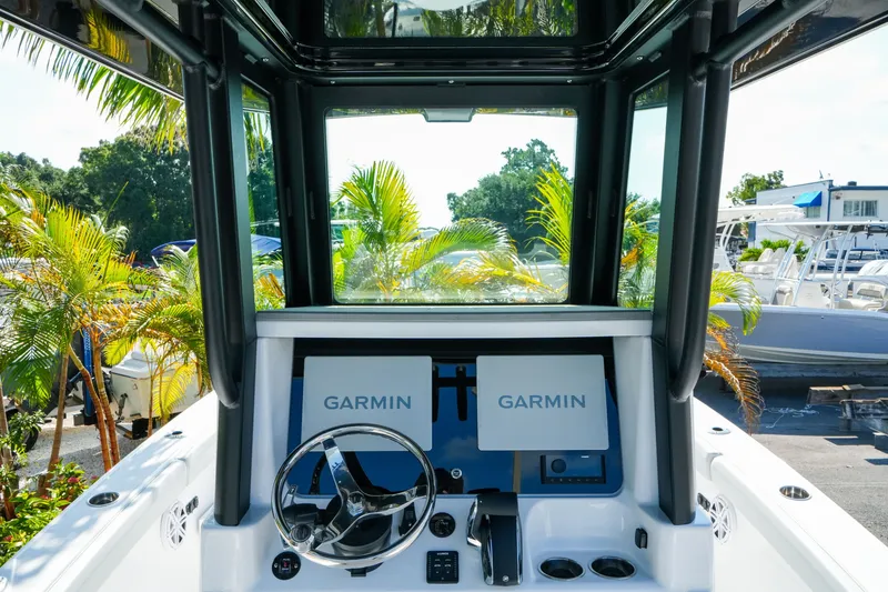 Slide: The Image of Interior view of 2027 Blackfin 262 HB boat with Garmin navigation system. - 18