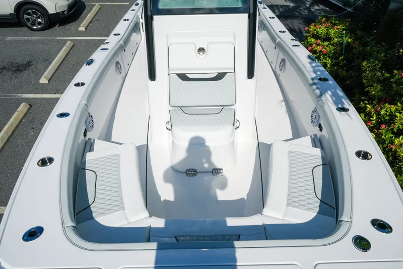 Slide: The Image of 2027 Blackfin 262 HB boat interior with white seating and modern design features. - 23