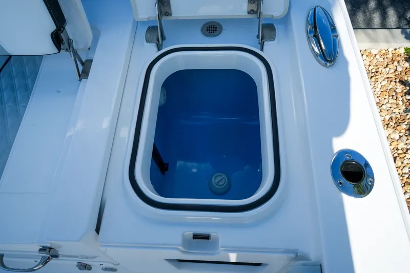 Slide: The Image of Livewell compartment on 2027 Blackfin 262 HB boat, featuring sleek design and functionality. - 31